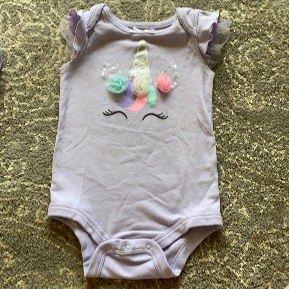 Purple unicorn onesie